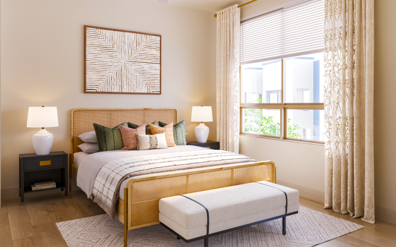 a bedroom with a large window